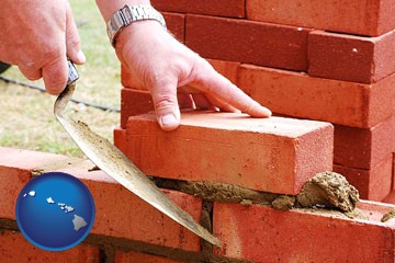 a bricklayer laying brick, building a brick wall - with Hawaii icon